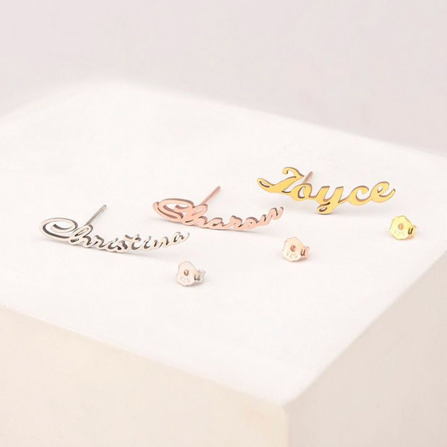 Featuring 18 K Gold Plated, 18K Rose gold plated, and Platinum custom name earring studs