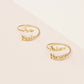 Custom Name Jewelry's double-name rings in 18-karat yellow gold.