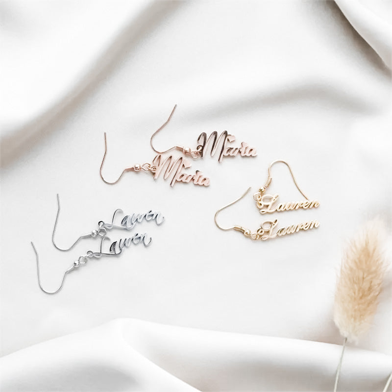 Custom name dangle earrings featuring silver, gold, and rose gold plated finish