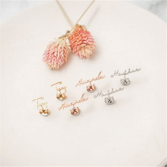 Image of Handwritten Custom Name Earrings featuring custom made earrings in rose gold, gold, and silver