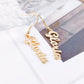 Close up photo of gold drop earrings from custom name jewelry